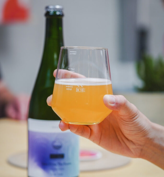 Hand holding a Cloudwater beer.