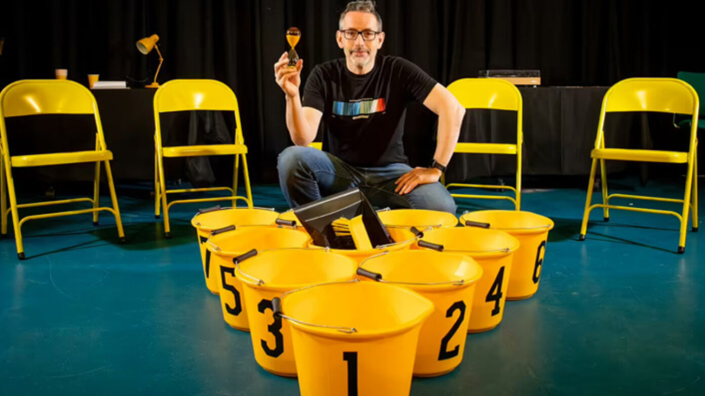 Steve Scott-Bottoms sat behind some yellow buckets.